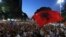 FILE - Anti-government protesters take part in a rally in Tirana, Albania, June 21, 2019. The opposition is boycotting the local elections planned for June 30 and has threatened to disrupt them.
