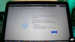 FILE - A computer screen showing a blocked Facebook window is seen in Colombo, Sri Lanka, March 7, 2018.