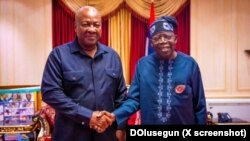 Zababben shugaban Ghana, John Dramani (hagu) da shugaban Najeriya, Bola Tinubu 