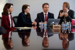 Activist Nazanin Boniadi, left; Sarah Moriarty, daughter of Robert Levinson; Babak Namazi, brother of Siamak Namazi and son of Baquer Namazi; and Richard Ratcliffe, husband of Nazanin Zaghari-Ratcliffe, attend a meeting in Washington, Dec. 3, 2019.