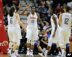 United States’ Sylvia Fowles with the team USA during the first half of a women's exhibition basketball game, July 29, 2016, in Bridgeport, Conn.