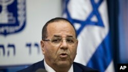 Israel's Communications Minister Ayoob Kara speaks during a press conference in Jerusalem, Sunday, Aug. 6, 2017. 