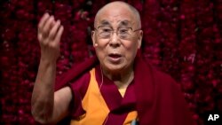 FILE - Tibetan spiritual leader the Dalai Lama speaks at a conference in New Delhi, India, Feb. 5, 2017. The Tibetan spiritual leader will visit India again next month. 