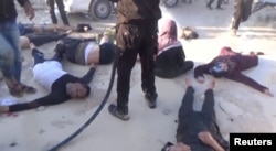 A still image taken from a video posted to a social media website on April 4, 2017, shows people lying on the ground, said to be in the town of Khan Sheikhoun, after what rescue workers described as a suspected gas attack in rebel-held Idlib, Syria.