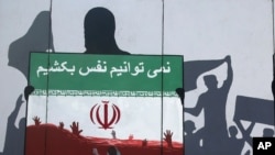 گرافیتی در کابل در اعتراض به کشتار مهاجران افغانستانی در مرز ایران - سال ۲۰۲۰