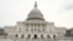 Runners stride past the U.S. Capitol building on the day of U.S. President Donald Trump's evening State of the Union address to a joint session of the U.S. Congress at the Capitol in Washington, U.S. Jan. 30, 2018. 