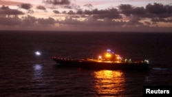 资料照片：中国解放军海军辽宁号航空母舰参加在台湾以东举行的“联合利剑-2024B ”军事演习。(2024年10月14日)