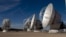 FILE - Radio telescope antennas of the ALMA (Atacama Large Millimeter/submillimeter Array) project, in the Atacama desert, some 1500 km north of Santiago, Chile, March 12, 2013. Scientists using the ALMA have detected, for the first time, methanol in the planet-forming disk around a very young star.