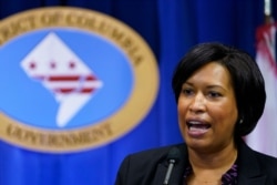 FILE - District of Columbia Mayor Muriel Bowser speaks during a news conference in Washington, Nov. 4, 2020.
