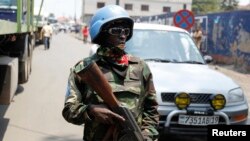 A U.N. peacekeeper patrols near the border crossing point between Rwanda and the Democratic Republic of Congo in Goma, Aug. 29, 2013.