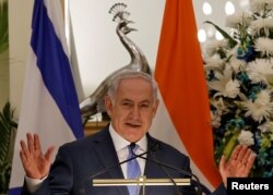 Israeli Prime Minister Benjamin Netanyahu gestures during a ceremony at Hyderabad House in New Delhi, India, Jan. 15, 2018.