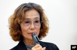 Junko Ishido, mother of Japanese hostage Kenji Goto held by Islamic State group, speaks during a press conference in Tokyo, Wednesday, Jan. 28, 2015.