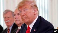 U.S. President Donald Trump attends a working breakfast with Finnish President Sauli Niinisto in Helsinki, Finland, Monday, July 16, 2018 prior to his meeting with Russian President Vladimir Putin in the Finnish capital.