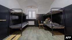 A photograph obtained from the Telegram account of Ukrainian President Volodymyr Zelenskyy purportedly shows a North Korean soldier detained by Ukrainian authorities at an undisclosed location in Ukraine, following his reported capture by the Ukrainian army.