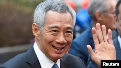 Singapore's Prime Minister Lee Hsien Loong arrives at the ASEM leaders summit in Brussels, Belgium October 19, 2018. REUTERS/Piroschka van de Wouw