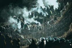 Hundreds of migrants camp at the Belarus side of the border with Poland near Kuznica Bialostocka, Poland, in this photo released by the Polish Defense Ministry, Nov. 10, 2021.