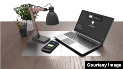 French startup company EnergySquare showed off what it called a “universal wireless charger” for laptop computers. (EnergySquare)