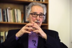 FILE - Former Iranian President Abolhassan Bani Sadr speaks with Reuters in Versailles, near Paris, France, Jan. 31, 2019.