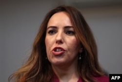 Stella Assange, wife of Julian Assange, speaks to the media at Doughty Street Chambers in London on March 26, 2024. She said the WikiLeaks founder "is being persecuted because he exposed the true cost of war in human lives."