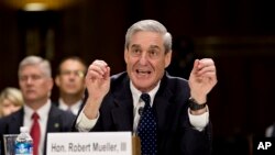 Then FBI Director Robert Mueller testifies on Capitol Hill in Washington, June 19, 2013, before the Senate Judiciary Committee.