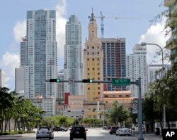 A high-rise building under construction is shown, Sept. 7, 2017, in downtown Miami.