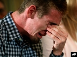 Samuel Zeif, an 18-year-old senior at Marjory Stoneman Douglas High School in Parkland, Fla., cries after speaking during a listening session with President Donald Trump