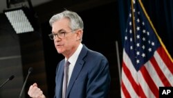 FILE - Federal Reserve Chair Jerome Powell speaks during a news conference.