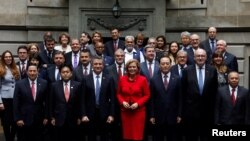Agriculture ministers pose for the official photo at the G20 Meeting of Agriculture Ministers at San Martin Palace in Buenos Aires, Argentina, July 27, 2018. 