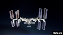 In this file photo, the International Space Station (ISS) is photographed by Expedition 56 crew members from a Soyuz spacecraft after undocking, October 4, 2018. (NASA/Roscosmos/Handout via REUTERS)