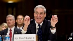 Then FBI Director Robert Mueller testifies on Capitol Hill in Washington, June 19, 2013, before the Senate Judiciary Committee.