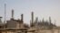 FILE - An oil facility in Jubeil, about 600 kilometers (370 miles) from Riyadh, Saudi Arabia, May. 3, 2009. 