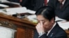 Japan Downgrades Economic Forecast
