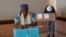 An elderly woman votes in Botswana's general elections in Moshupa, some 45kms (30 miles) West of Gaborone, Wednesday, Oct. 23, 2019.