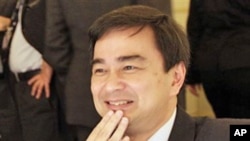 Thailand's Prime Minister Abhisit Vejjajiva waits for the start of the closing ceremony at the EU Asia summit in Brussels (FILE).