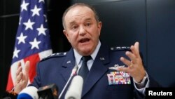 FILE - U.S. Air Force General Philip Breedlove, pictured at a Kyiv news conference in November 2014, says Russia is seeking to tighten its grip on separatist fighters "because there was disunity" inn some earlier attacks.