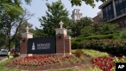 FILE - In this July 6, 2021, file photo, an electronic signboard welcomes people to the Howard University campus in Washington. Howard is one of more than 100 HBCUs recognized by the U.S. Department of Education. (AP Photo/Jacquelyn Martin, File)