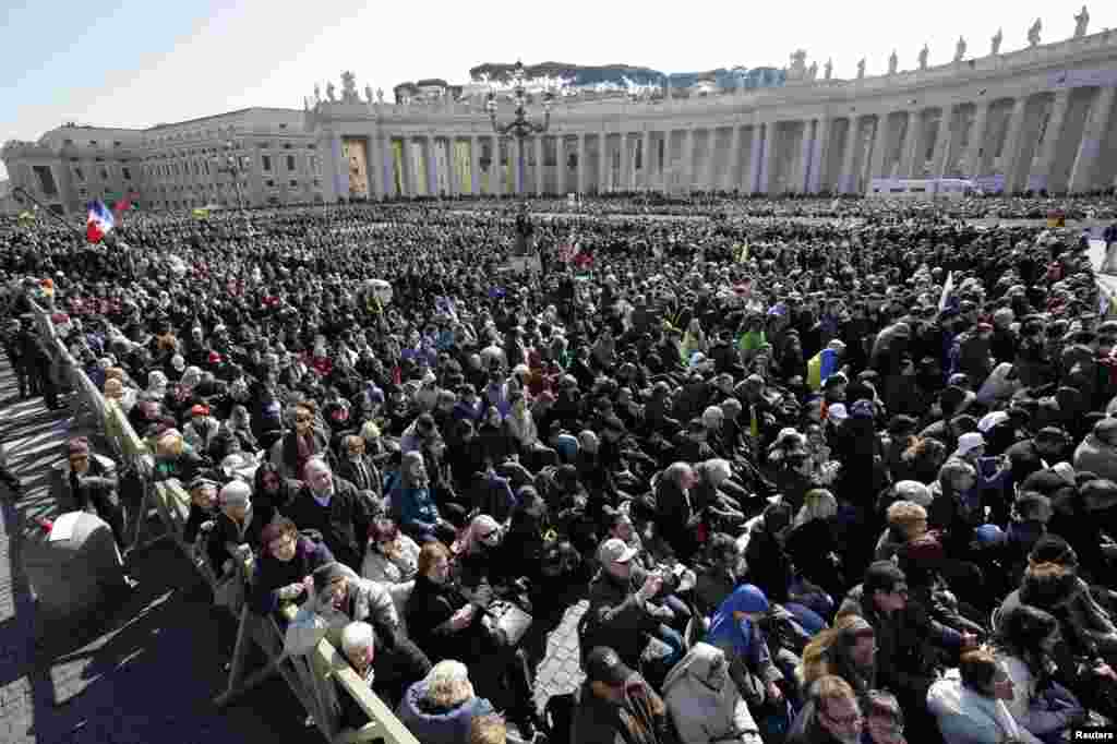 The crowd listens to Pope Benedict in St. Peter&#39;s Square during his last general audience at the Vatican, Feb. 27, 2013. 