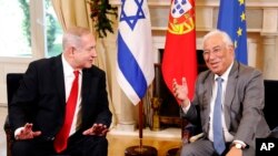 Israeli Prime Minister Benjamin Netanyahu, left, and Portuguese Prime Minister Antonio Costa meet at the Sao Bento palace in Lisbon, Dec. 5, 2019.