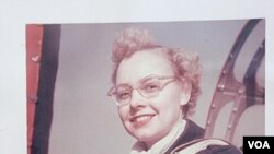 Libby Haynes takes a flying lesson. By 1945 young Libby had finished a training course of the Civil Air Patrol Cadet Program.