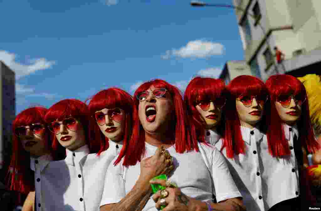A reveler takes part in an annual block party known as "Academicos do Baixa Augusta" (Academics of Baixa Augusta neighbourhood), during carnival festivities in Sao Paulo, Brazil.