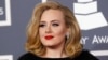 British singer Adele arrives at the 54th annual Grammy Awards in Los Angeles, Calif. Feb. 12, 2012. 