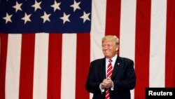 U.S. President Donald Trump arrives at a campaign rally in Phoenix, Arizona, Aug. 22, 2017.