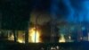 The U.S. Consulate in Benghazi, Libya burns during a September 2012 attack that killed the U.S. Ambassador and three others. 