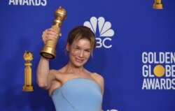 FILE - Renee Zellweger poses with the award for best performance by an actress in a motion picture drama for "Judy" at the 77th annual Golden Globe Awards at the Beverly Hilton Hotel, Jan. 5, 2020, in Beverly Hills, California.