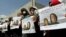 Women hold posters of Frenchwoman, Isabelle Prime (R) and her Yemeni translator Shereen Makawi, during a protest to demand their release, in San'aa, Yemen, March 9, 2015.