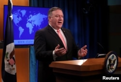 FILE - U.S. Secretary of State Mike Pompeo speaks to reporters at the State Department in Washington, Oct. 23, 2018.