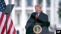 FILE - President Donald Trump speaks at a rally protesting the certification of Joe Biden as President, Jan. 6, 2021, in Washington. A federal appeals court rejected Trump’s claim that he has immunity from charges that he plotted to overturn his election defeat.