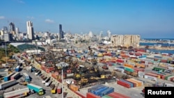 A picture taken with a drone shows a general view of the site of the Aug. 4, 2020 explosion in Beirut's port, after almost a year since the blast, Lebanon, Aug. 2, 2021. 