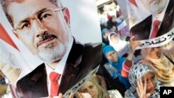 A photographer on a&nbsp; Ferris wheel catches the image of he Earth&#39;s shadow crossing the moon during a total lunar eclipse in Tokyo, Japan, Oct. 8, 2014.
