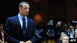 South African Olympic sprinter Oscar Pistorius appears at the Magistrate Court in Pretoria on February 22, 2013.